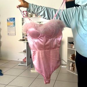 Body suit pink. Worn once